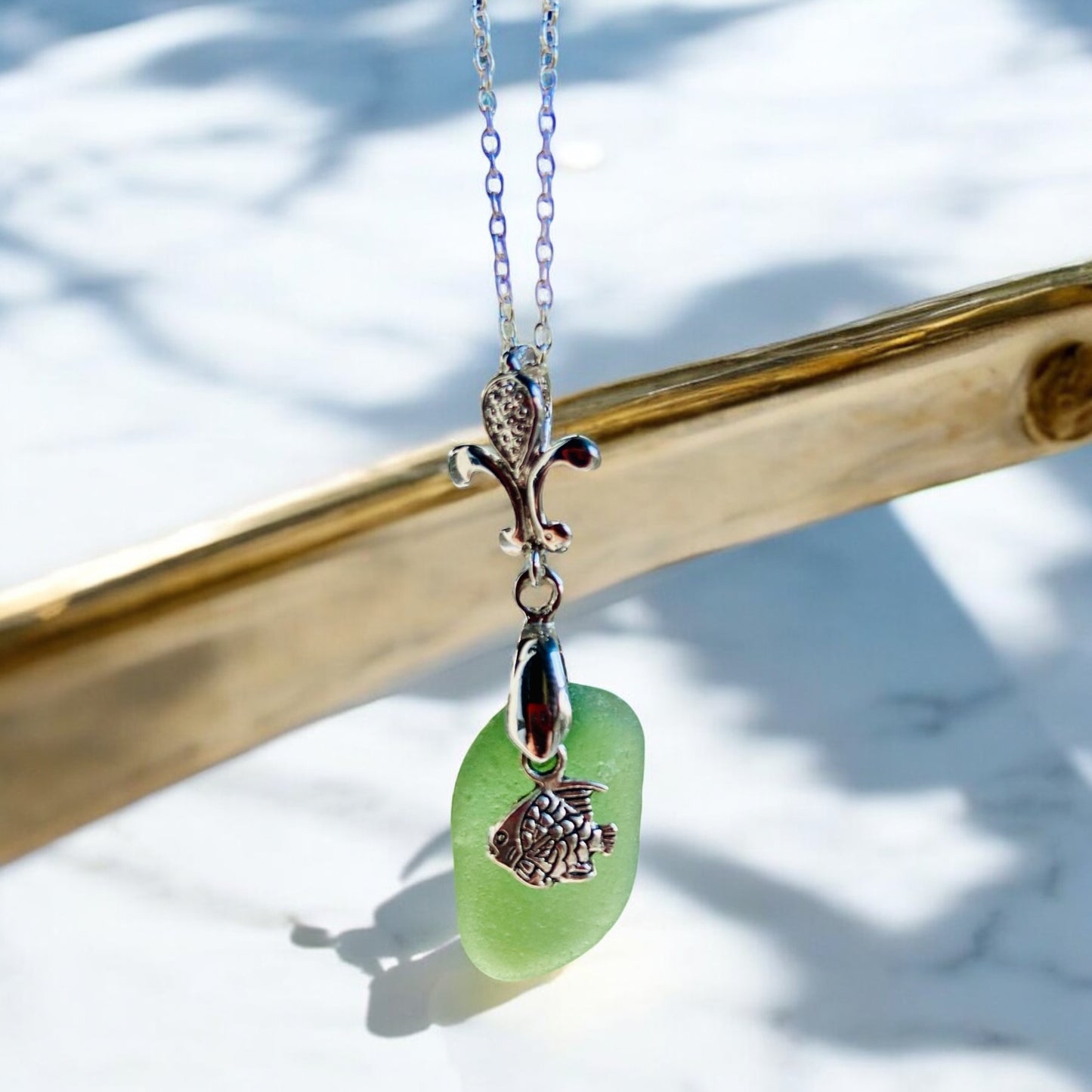 Beautiful Green Devon sea glass, fish charm pendant necklace, presented on an 20 inch 925 sterling silver chain with a lobster clasp