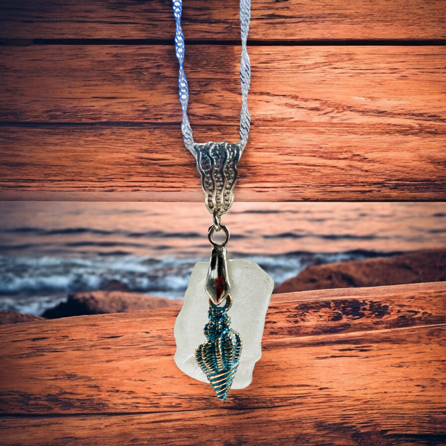 Beautiful handmade White sea glass pendant necklace with shell charm, presented on a 20 inch 925 sterling silver chain