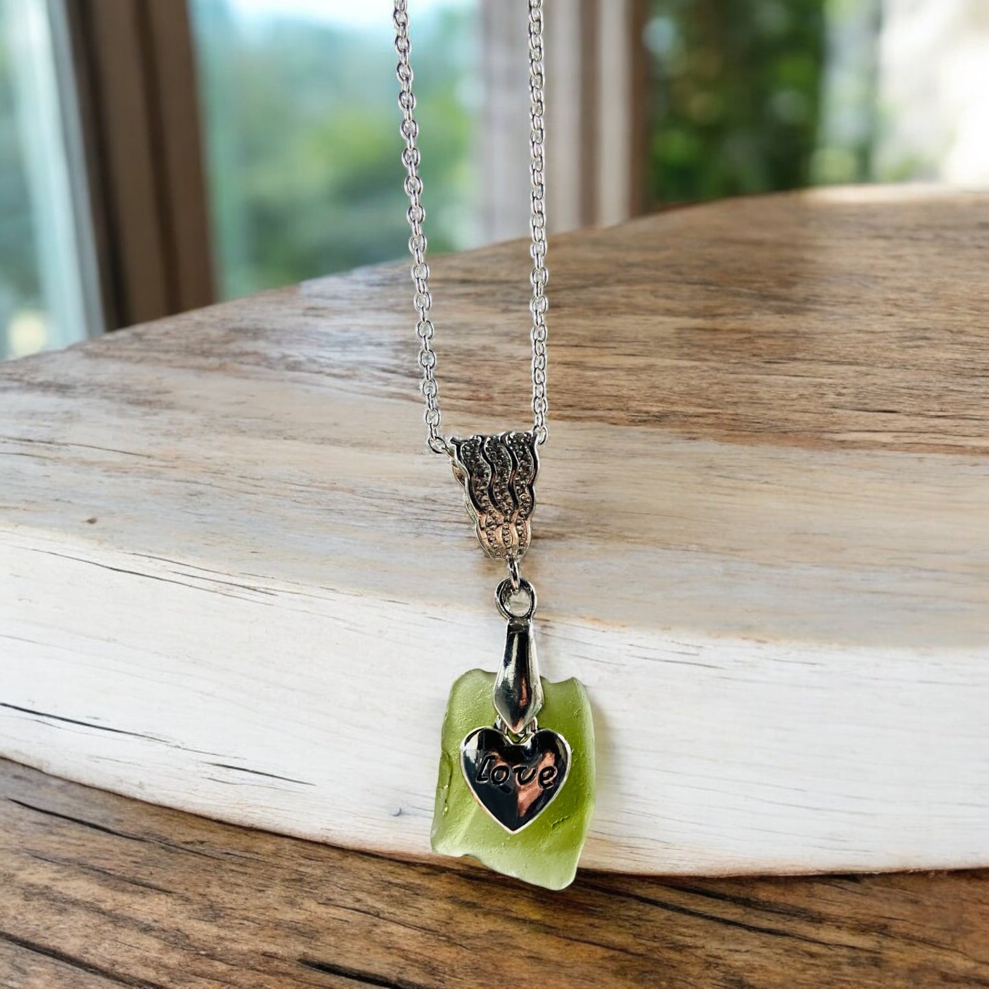 Beautiful green Devon sea glass, love heart charm pendant necklace, presented on an 20 inch 925 sterling silver chain with a lobster clasp