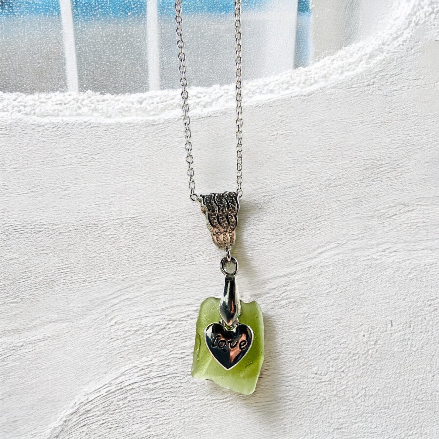 Beautiful green Devon sea glass, love heart charm pendant necklace, presented on an 20 inch 925 sterling silver chain with a lobster clasp