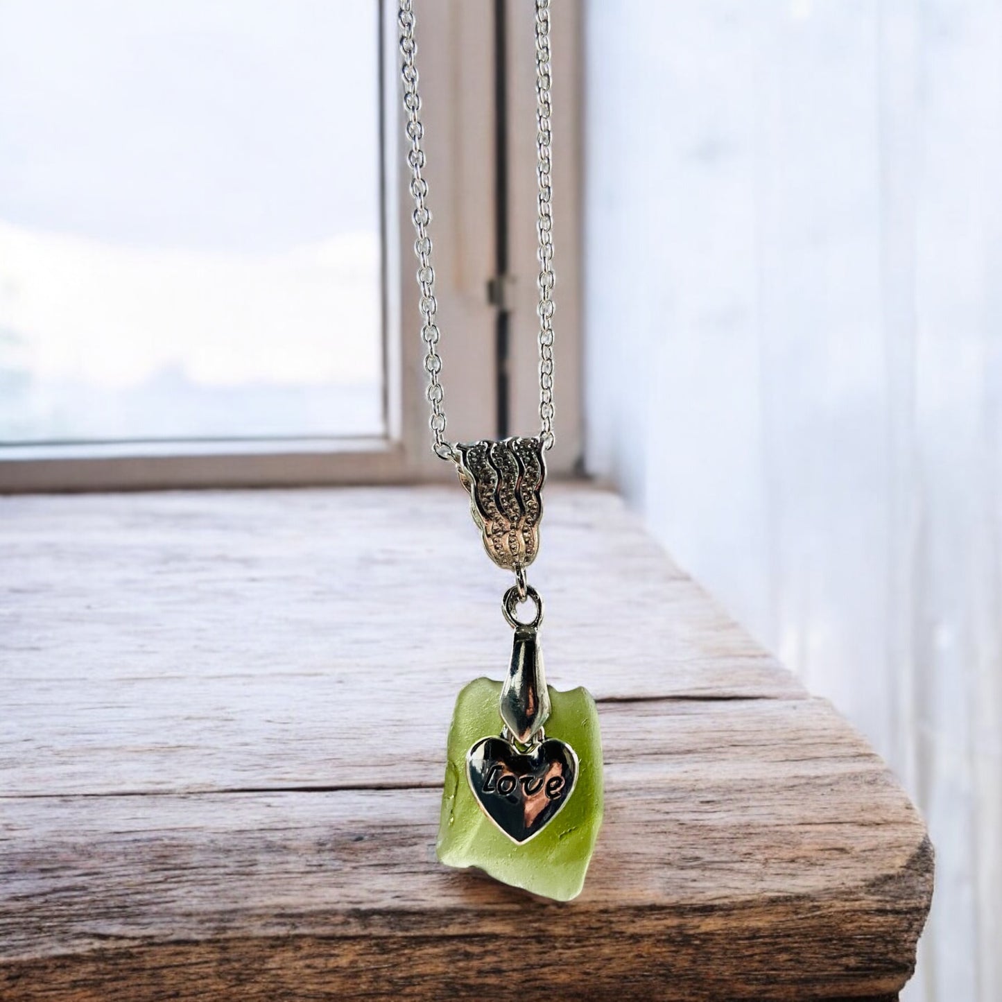 Beautiful green Devon sea glass, love heart charm pendant necklace, presented on an 20 inch 925 sterling silver chain with a lobster clasp
