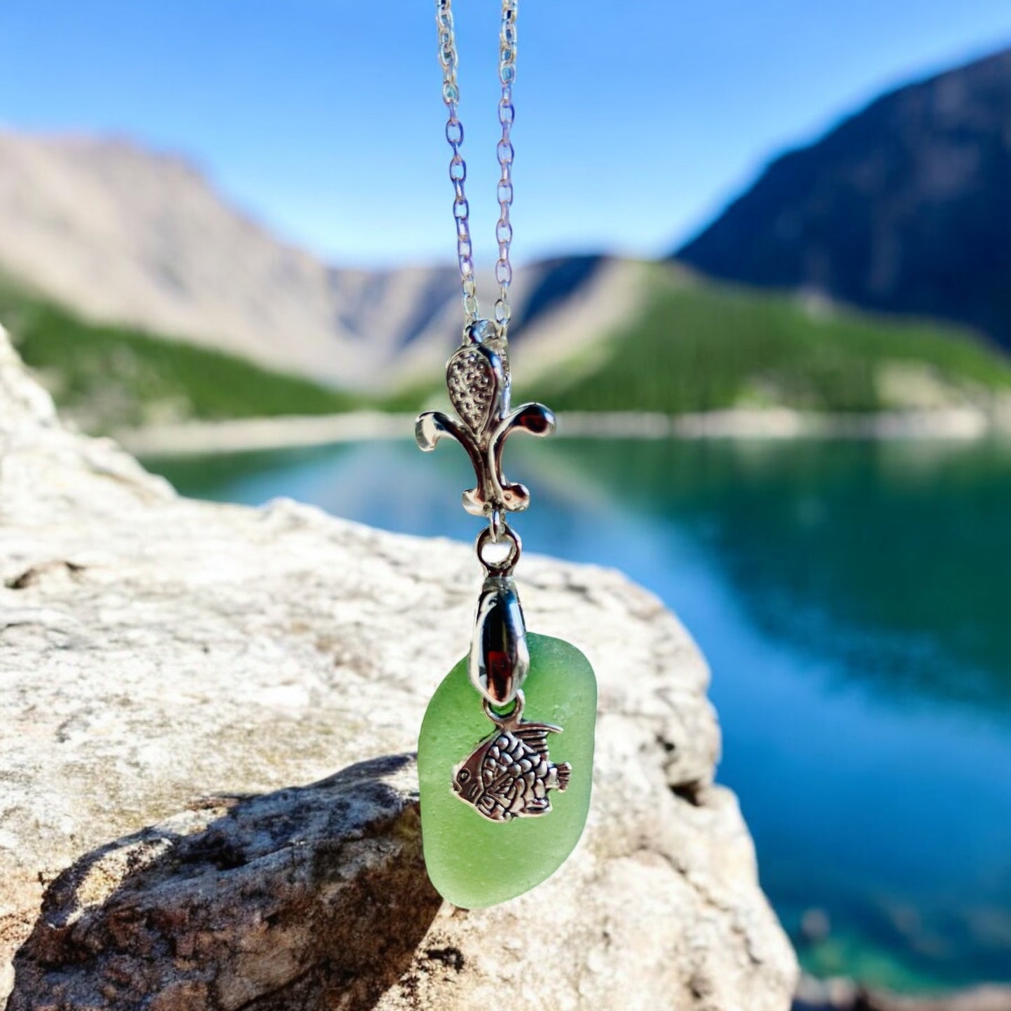 Beautiful Green Devon sea glass, fish charm pendant necklace, presented on an 20 inch 925 sterling silver chain with a lobster clasp