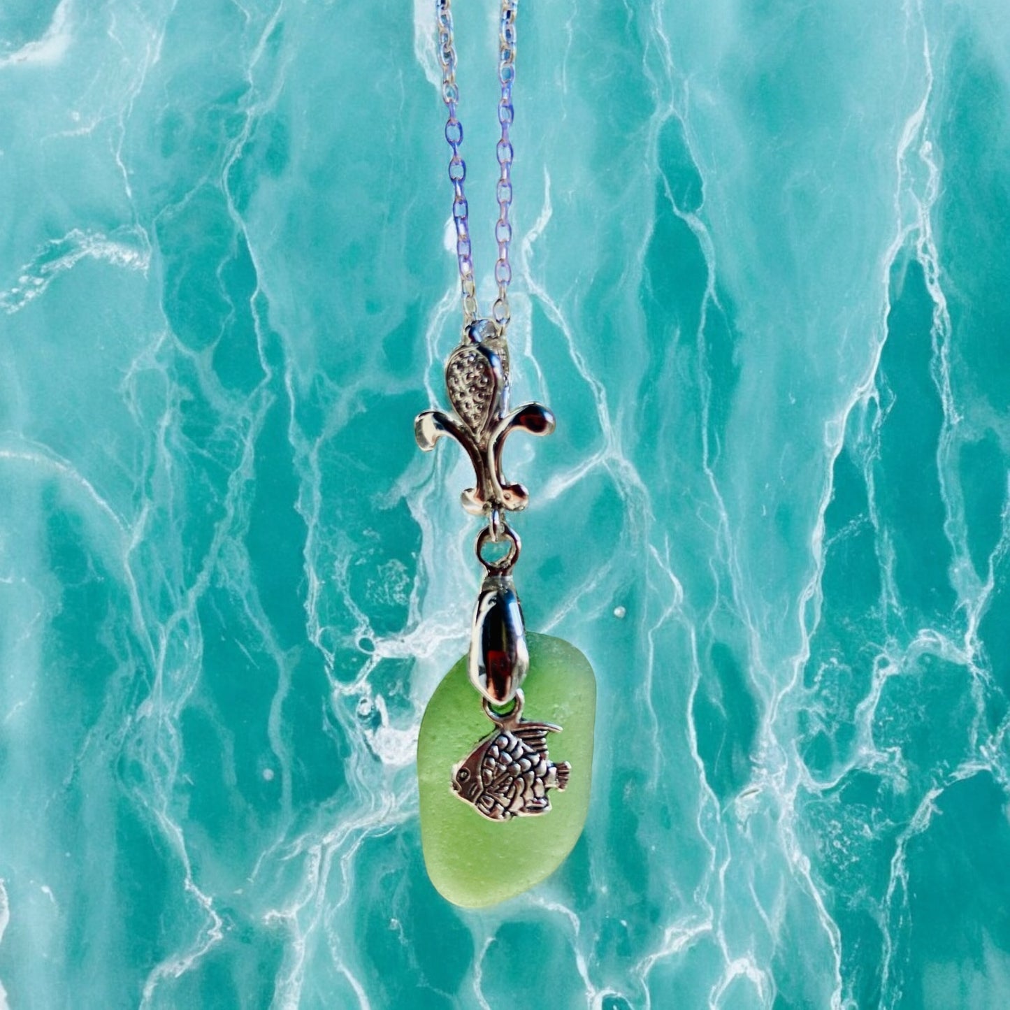 Beautiful Green Devon sea glass, fish charm pendant necklace, presented on an 20 inch 925 sterling silver chain with a lobster clasp