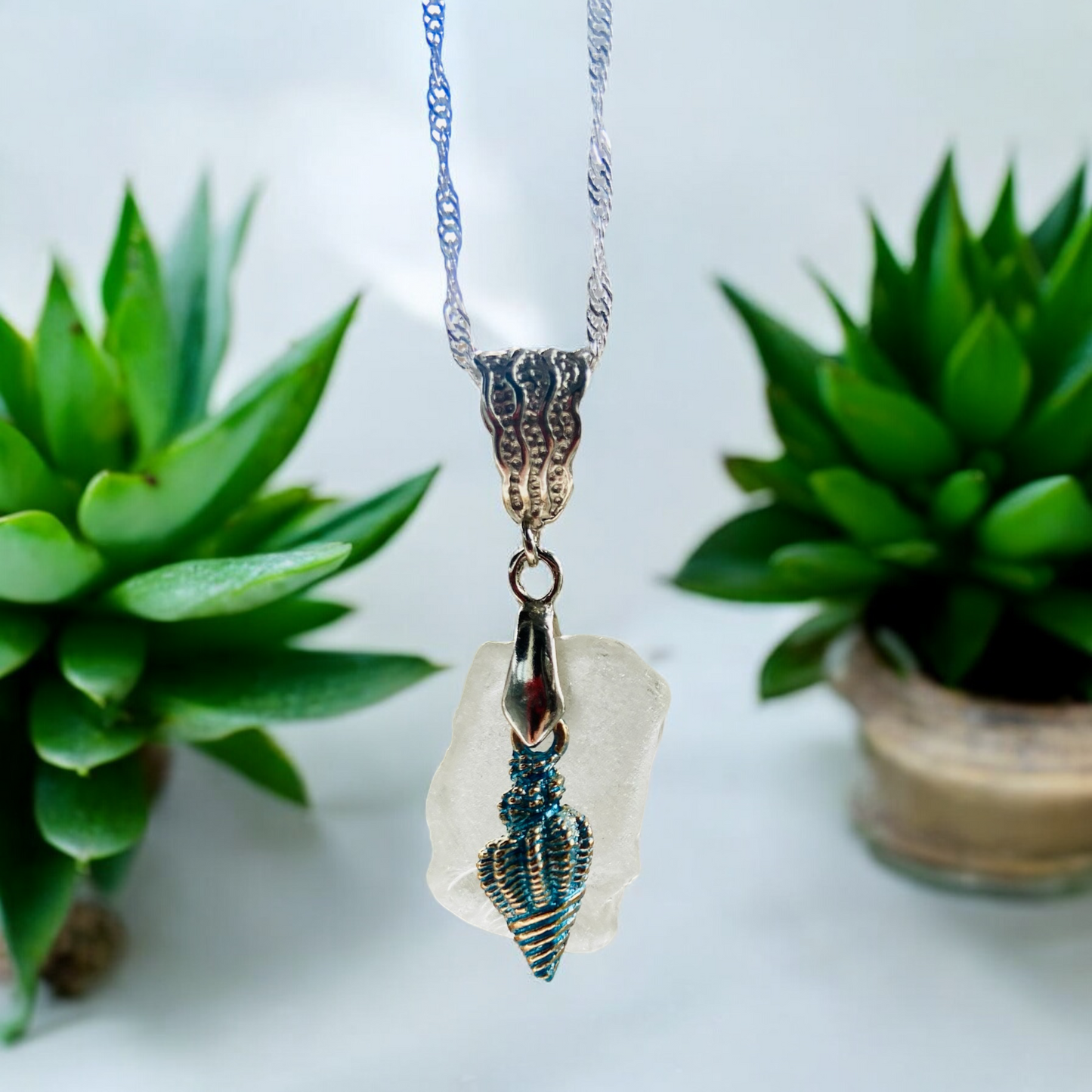 Beautiful handmade White sea glass pendant necklace with shell charm, presented on a 20 inch 925 sterling silver chain