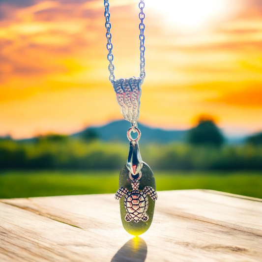 Beautiful handmade Green sea glass pendant necklace, with turtle charm presented on a 20 inch 925 sterling silver chain