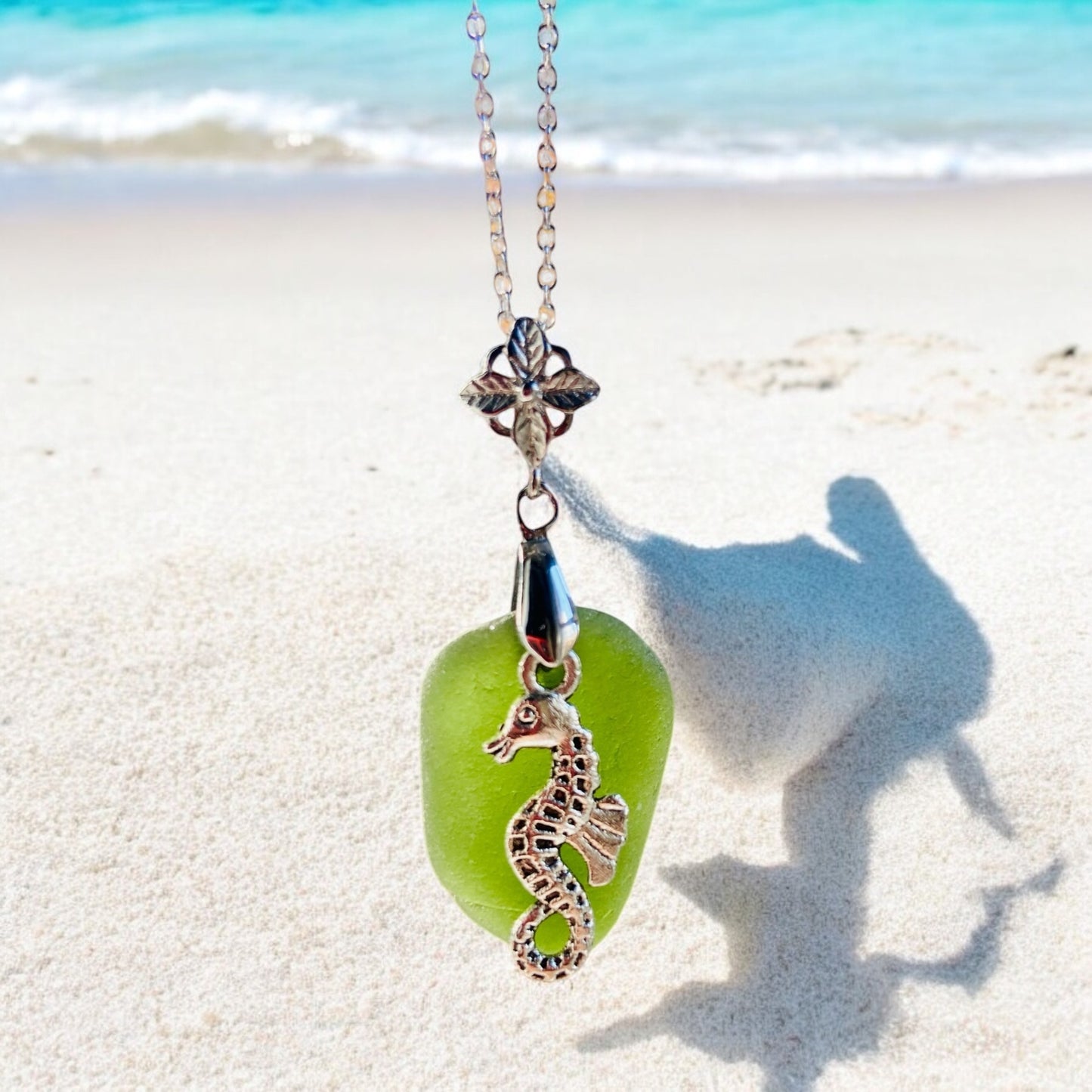 Beautiful handmade Green sea glass pendant necklace with seahorse charm, presented on a 20 inch 925 sterling silver chain