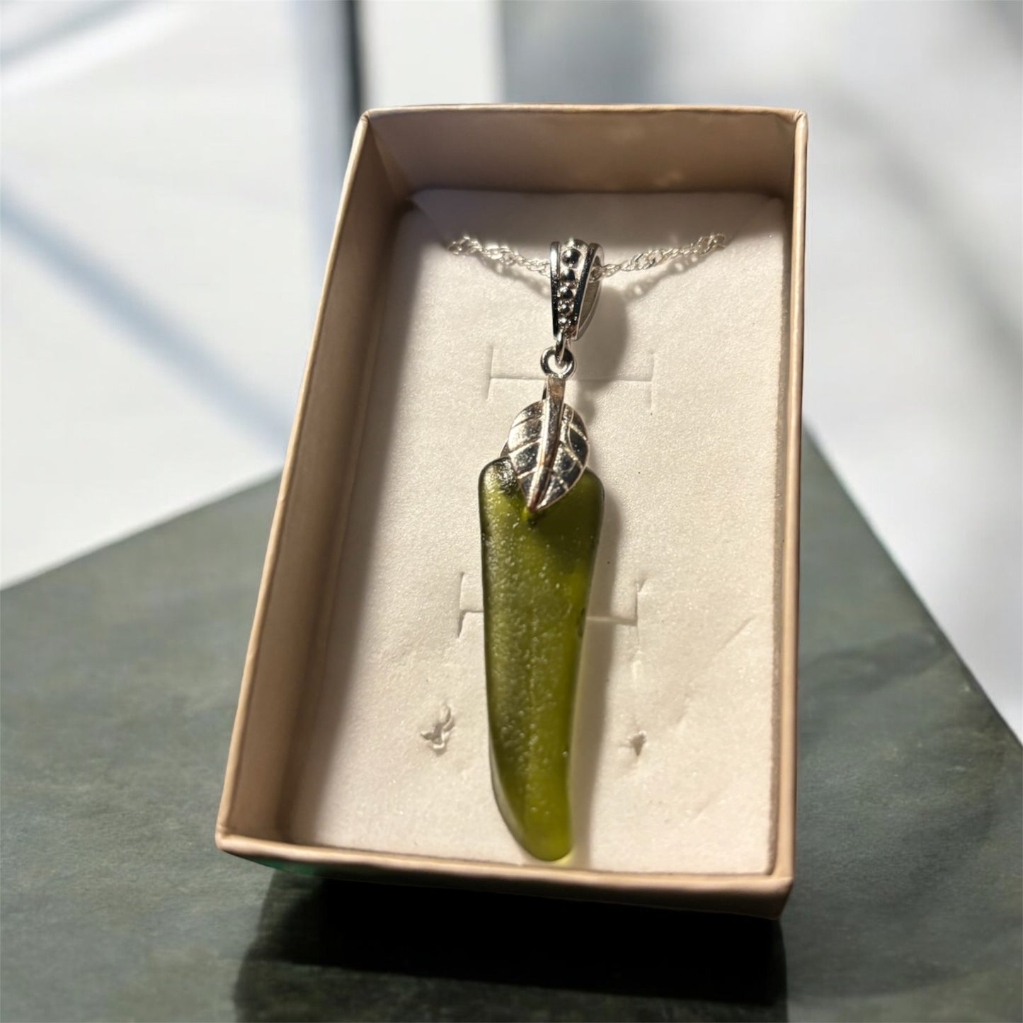 Beautiful green Seaham sea glass pendant necklace presented on an 18 inch 925 sterling silver chain with a lobster clasp